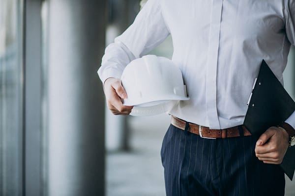 handsome-business-man-engineer-in-hard-hat-in-building
